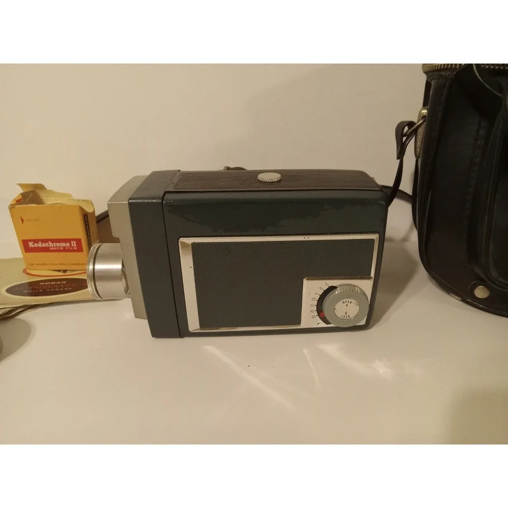 Used Vintage Kodak Automatic 8 Movie Camera with manual film and carrying case.